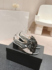 HIGH SANDAL WITH PEARL CHAIN BLACK LAMBSKIN WITH WHITE RHINESTONES