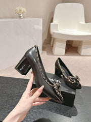 BOWKNOT HIGH HEELS IN BLACK SHEEPSKIN