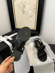 MID HEEL SANDALS IN BLACK CALFSKIN WITH BOW