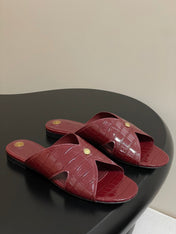 FLAT SLIPPERS IN RED CALFSKIN SNAKE EMBOSSING