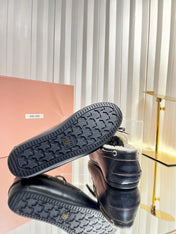 MIUMIU 26S FUR BOAT SHOES IN BLACK CALFSKIN