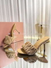 MIUMIU 26S HIGH-HEEL MULE SANDALS 85MM IN BEIGE CALFSKIN GOLD HARDWARE
