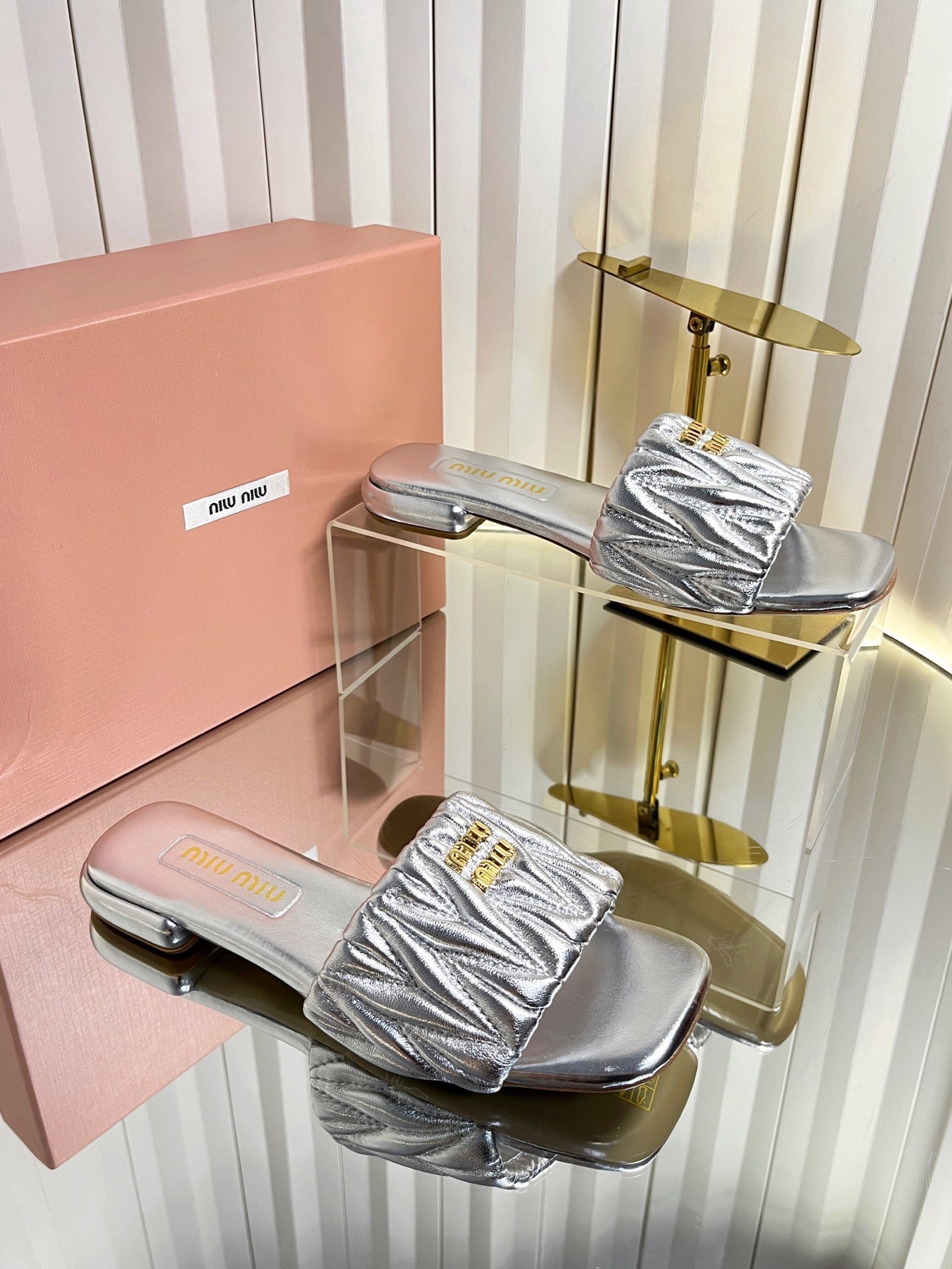 MIUMIU 26S MATELASSE SLIDES IN SILVER CALFSKIN GOLD HARDWARE