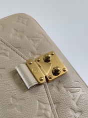 POCHETTE MÉTIS EAST WEST 22 IN LIGHT BEIGE MONOGRAM EMPREINTE CALFSKIN EMBOSSED
