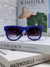 MONOGRAM SUNGLASS 581385 IN BLUE ACETATE FRAME