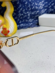 MONTAIGNE SUNGLASS 563191 IN GOLD METAL PINK SMOKE LENSES