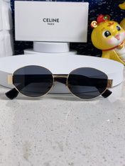 TRIOMPHE SUNGLASS 538532 IN BLACK ACETATE GOLD METAL