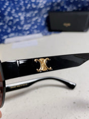 TRIOMPHE SUNGLASS 538534 IN BLACK ACETATE