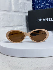 OVAL SUNGLASSES 640341 IN NUDE ACETATE METAL FRAME
