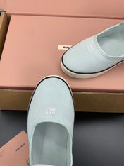 MIUMIU 26S MARY JANE FLATS IN PALE MINT CANVAS LOGO