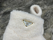 PRADA 26S ANKLE BOOTS IN WHITE FUR