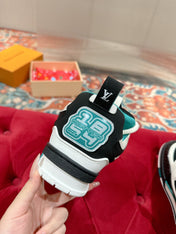 LV SKATE SNEAKER IN WHITE MIX BLACK AND PERSIAN GREEN CALFSKIN