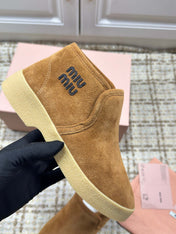 MIUMIU 26S SLIP-ON BOOTIES IN CAMEL BROWN SUEDE WITH SHEARLING