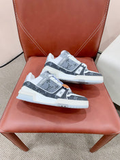 LV TRAINER SNEAKER IN DOVE GRAY MONOGRAM DENIM