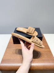 ALAIA FLAT SANDALS WITH PERFORATED STRAPS 25S IN BEIGE SUEDE
