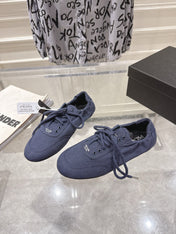 PRADA 26S COLLAPSE SNEAKERS IN BLUE CANVAS