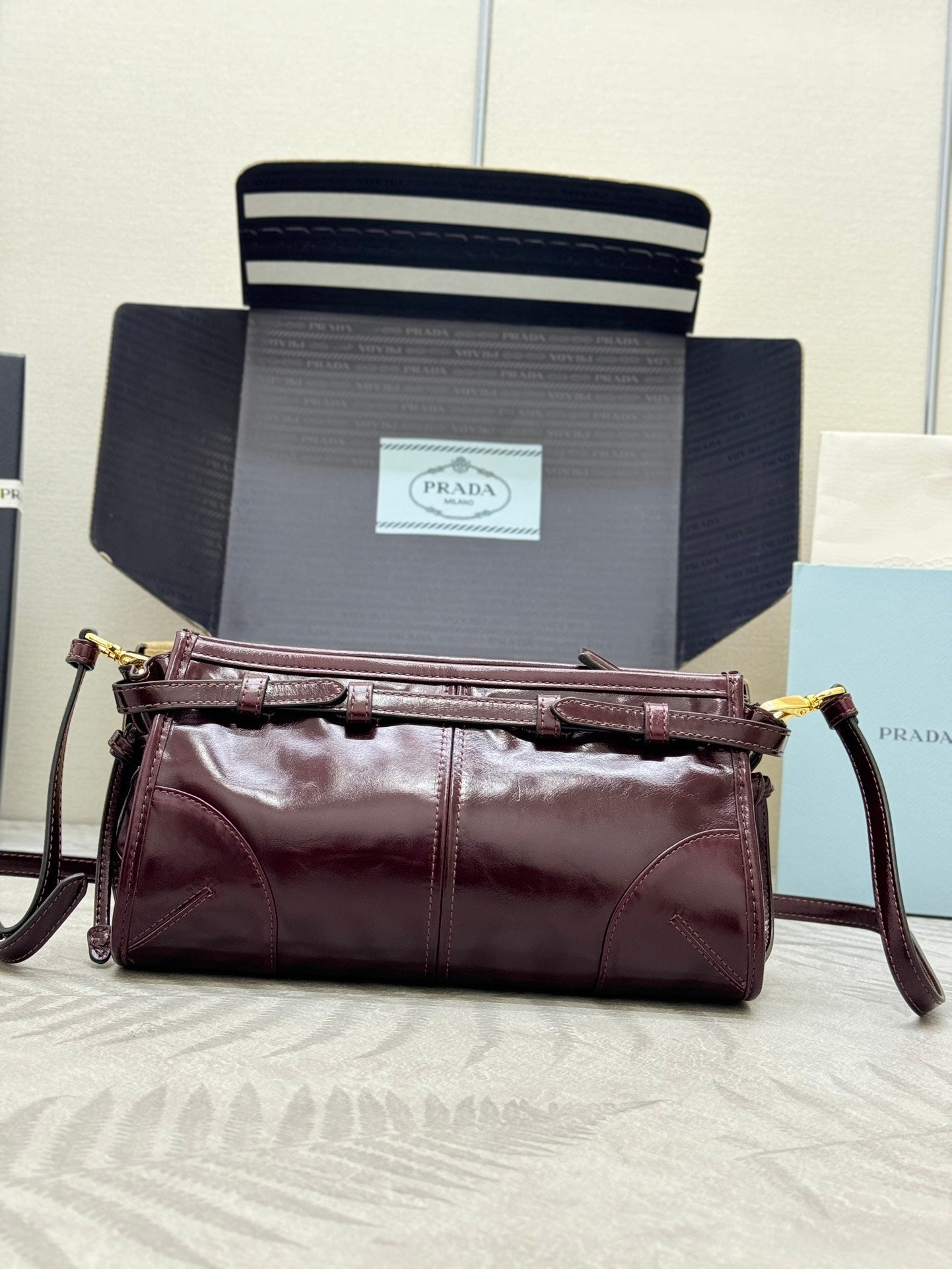 PRADA 25S BONNIE SMALL SHOULDER BAG 26 IN BURGUNDY GLOSSY CALFSKIN GOLD HARDWARE