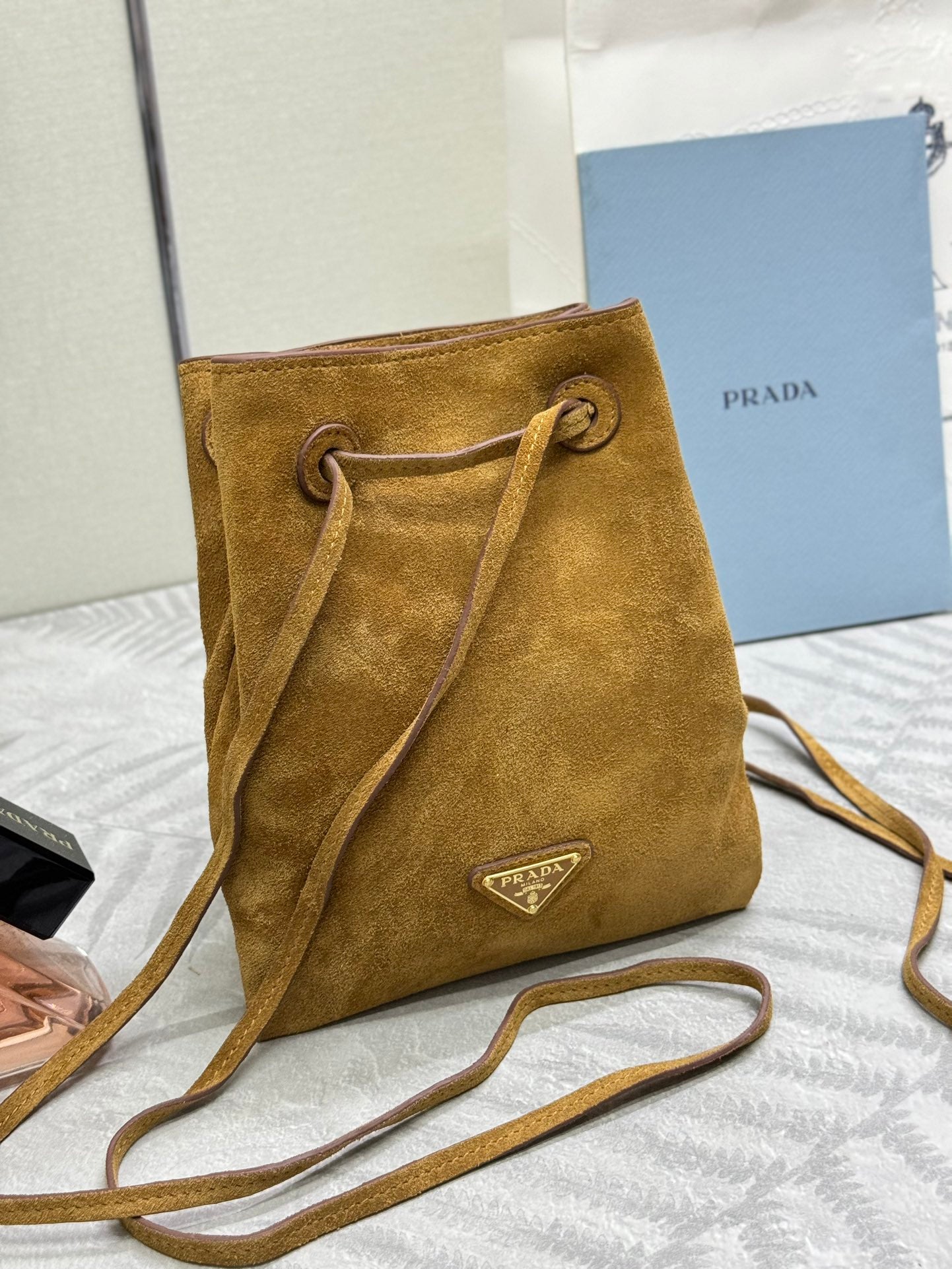 PRADA 25S BUCKET BAG 20 IN LIGHT CARAMEL SUEDE GOLD HARDWARE