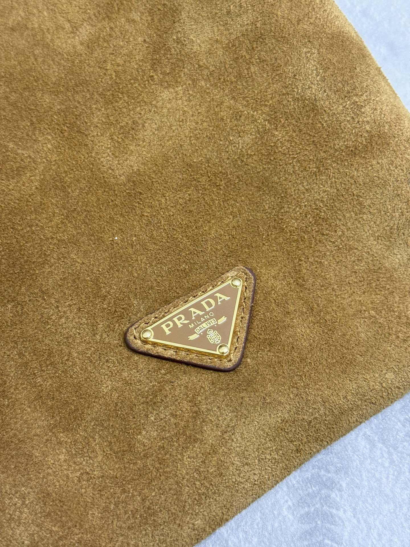 PRADA 25S BUCKET BAG 20 IN LIGHT CARAMEL SUEDE GOLD HARDWARE