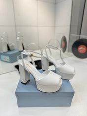 PRADA 26S HEELED SANDALS 115MM IN WHITE CALFSKIN