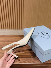 PRADA 26S SLINGBACK PUMPS IN WHITE CALFSKIN
