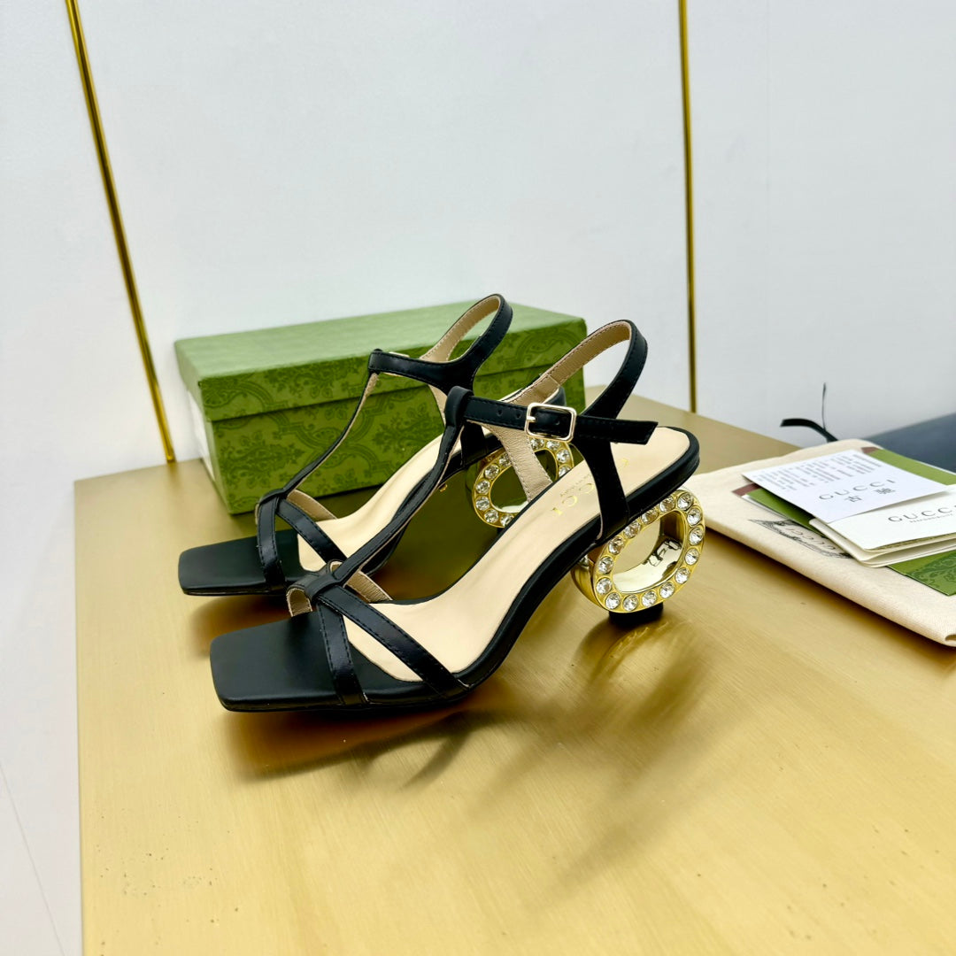 MEDIUM-HEEL SANDAL IN BLACK CALFSKIN GOLD HARDWARE WITH RHINSTONES