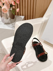 MAUD SANDAL WITH TRIOMPHE IN RUST BROWN CALFSKIN