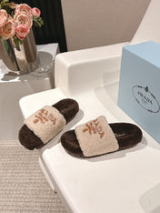 PRADA 25S FLAT MULES IN CREAM AND DARK BROWN RABBIT FUR