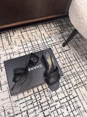 MID HEEL MULES IN BLACK SHEEPSKIN