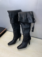 YSL 25S HIGH‑HEEL FRINGED MARTIN BOOTS 90 MM IN BLACK LAMBSKIN
