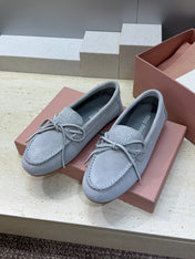 MIUMIU 26S LOAFERS IN LIGHT BLUE SUEDE WITH BOW