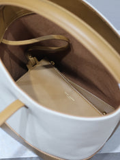 YSL 25S LE 5 À 7 BUCKET 26 IN CREAM BROWN CALFSKIN AND CANVAS GOLD HARDWARE