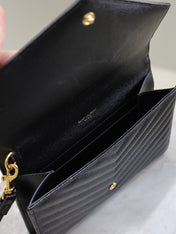 CASSANDRE CLUTCH 21 IN BLACK LAMBSKIN GOLD HARDWARE