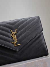 CASSANDRE CLUTCH 21 IN BLACK LAMBSKIN GOLD HARDWARE