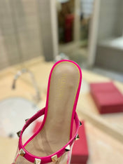 ROCKSTUD MULE SANDALS IN BRIGHT PINK CALFSKIN AND TRANSPARENT PVC FILM