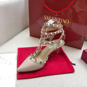 ROCKSTUD PALE PINK METALLIC CALFSKIN ANKLE STRAP HIGH SANDAL
