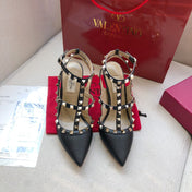ROCKSTUD BLACK METALLIC CALFSKIN ANKLE STRAP HIGH SANDAL