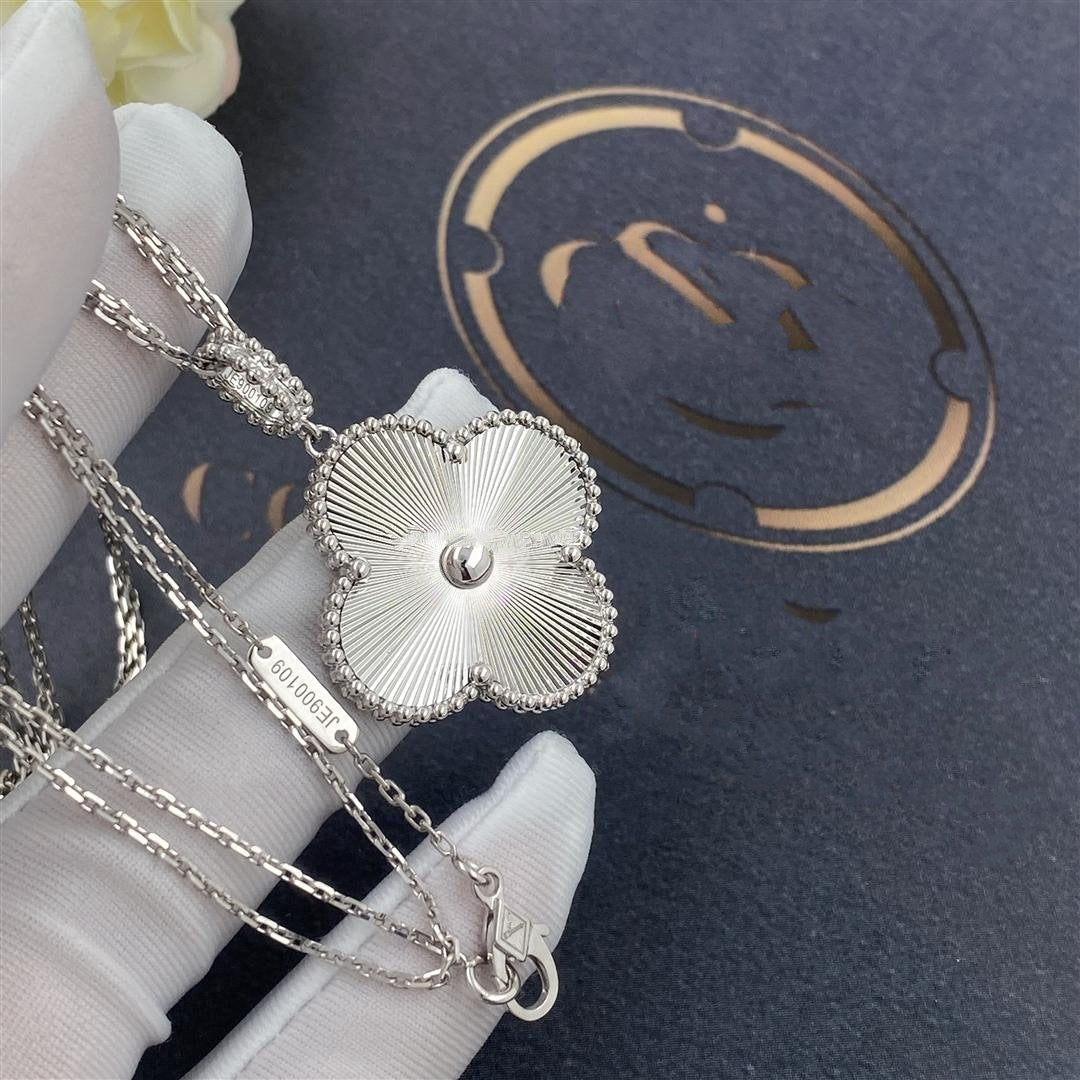 van-cleef-arpels-magic-alhambra-long-necklace-1-motif-white-gold-1_60c51837-9378-4d56-ac40-11d8d43da4bd.jpg