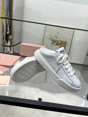 SNEAKER MULES IN WHITE BLEACHED CALFSKIN